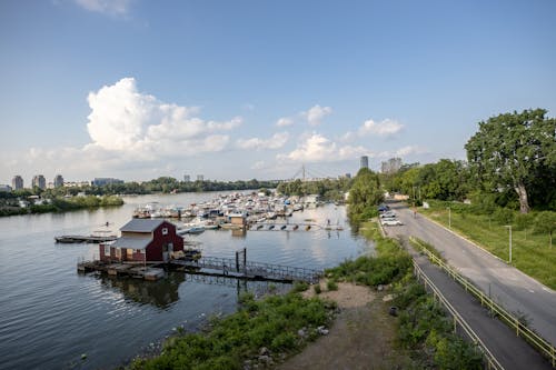 Riverside Boathouse with a Marina in the Background