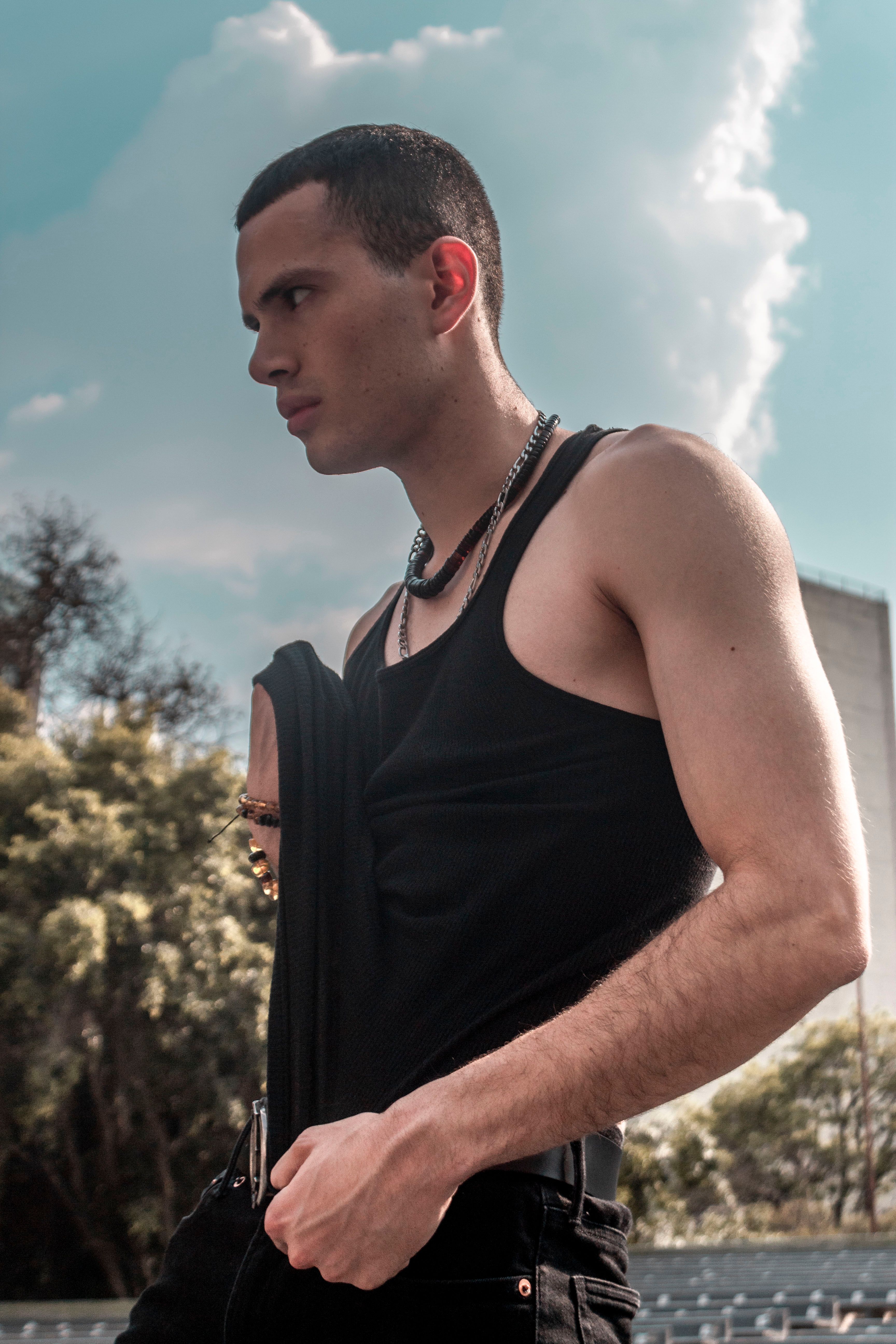 Portrait of a Young Man Wearing a Black Tank Top · Free Stock Photo