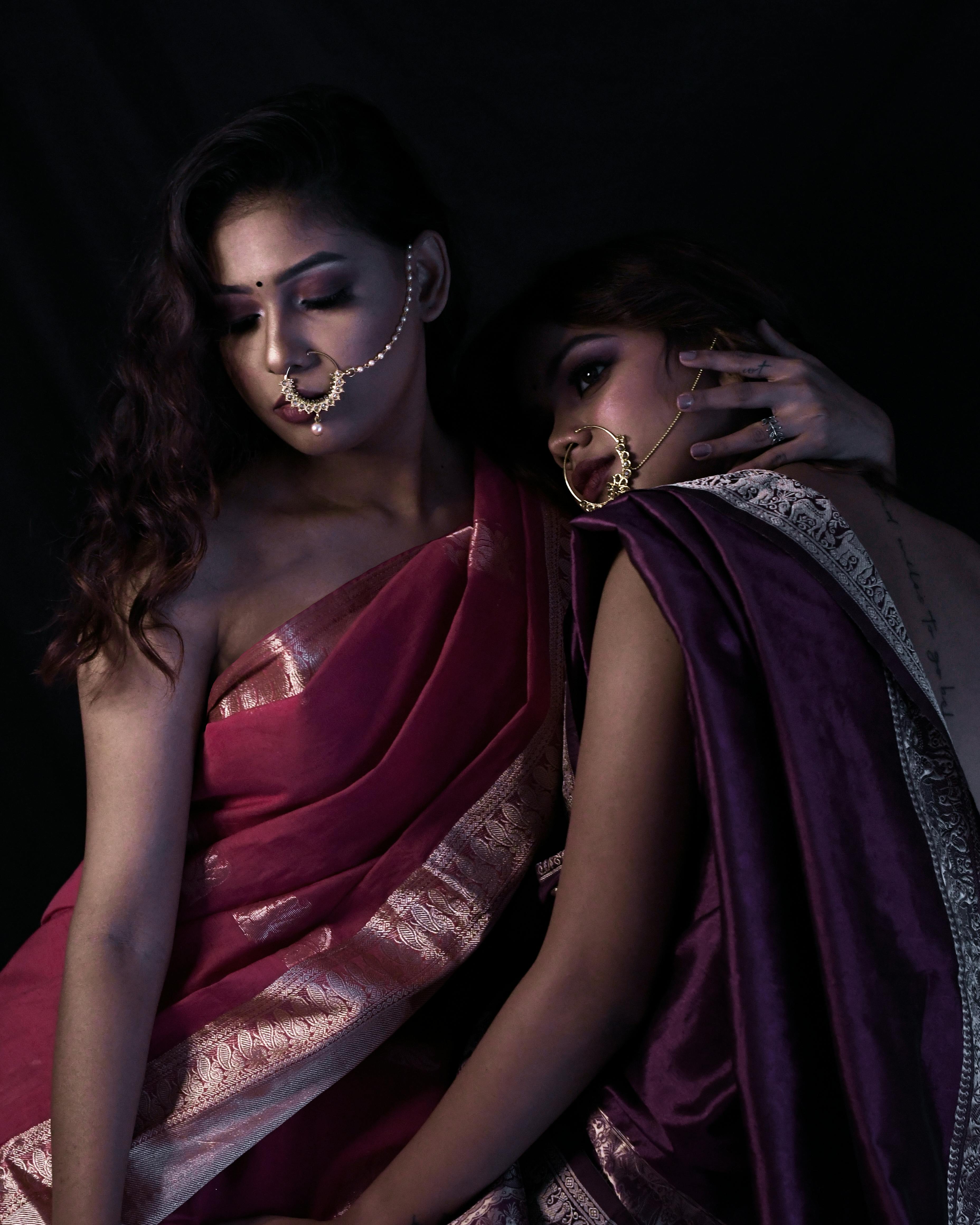 Indian woman in studio, fashion portrait of pose style with arms and  glamour beauty in India.