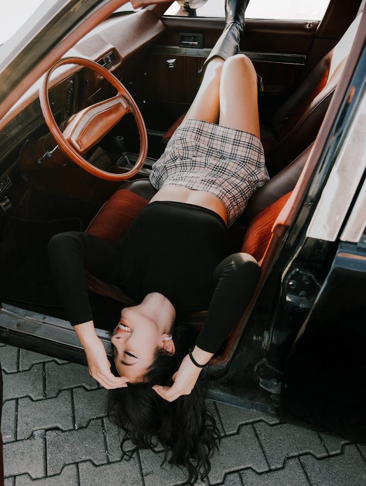 Woman Laying In Car