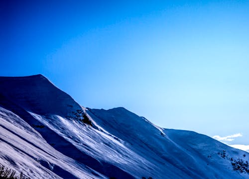 Foto profissional grátis de céu limpo, lado da montanha, montanha