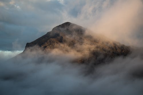 Clouds Covering High Mountain