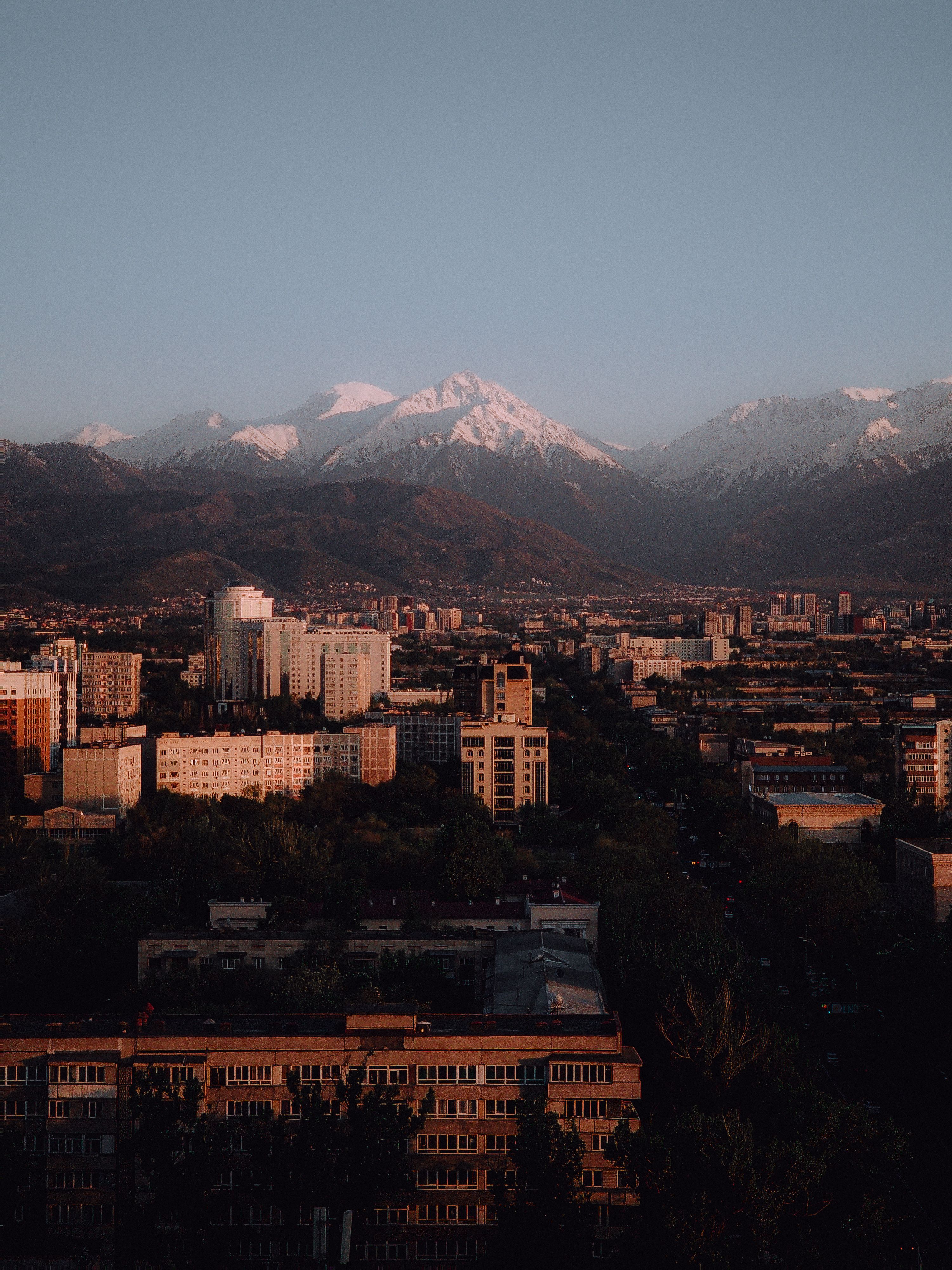 Mountains Towering over City in Kazakhstan · Free Stock Photo
