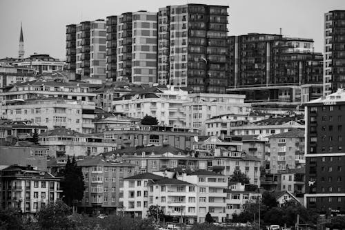 Black and White Photo of Apartment Buildings in City 