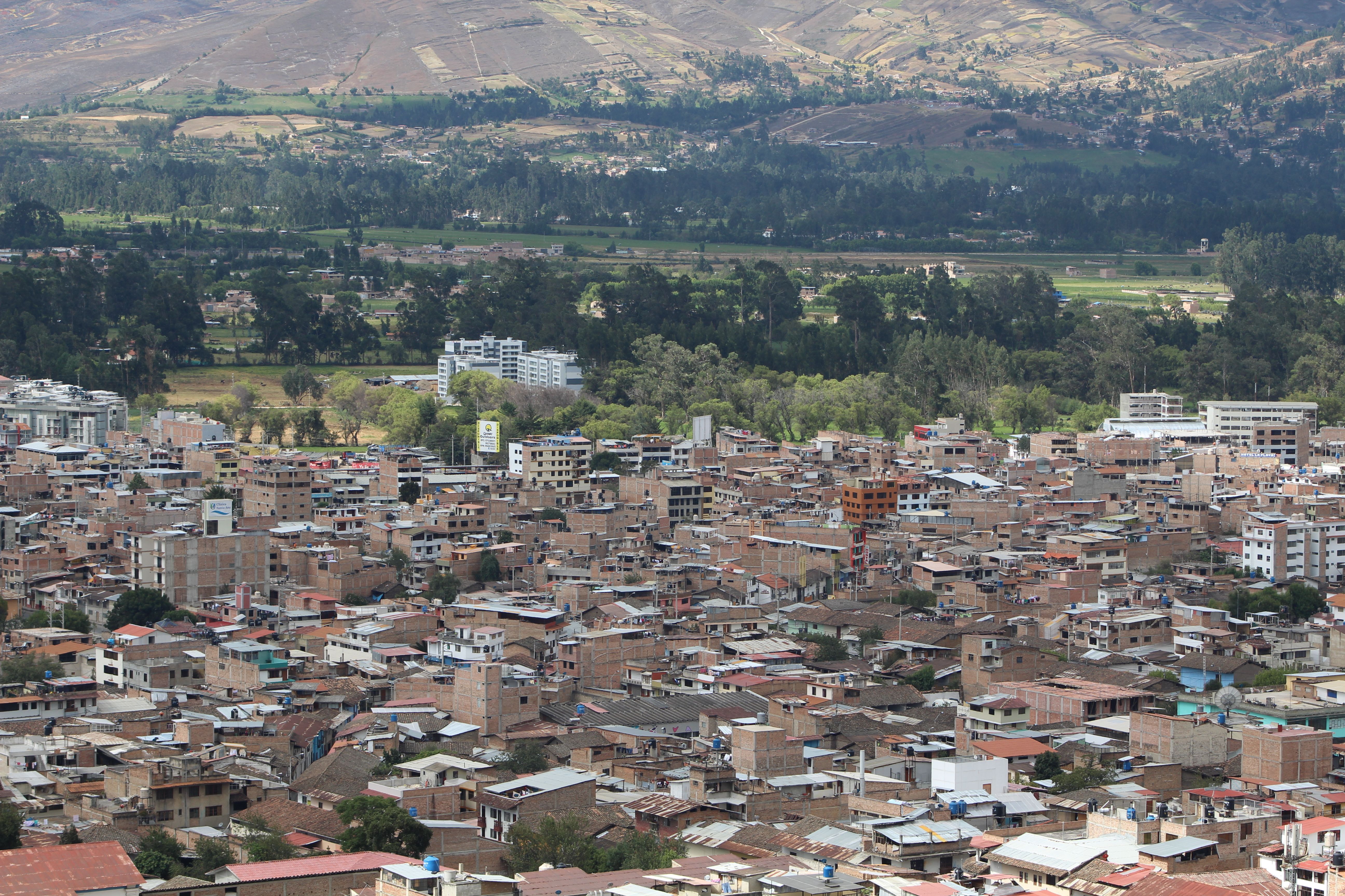 Aerial View of a Town in a Mountain Valley · Free Stock Photo