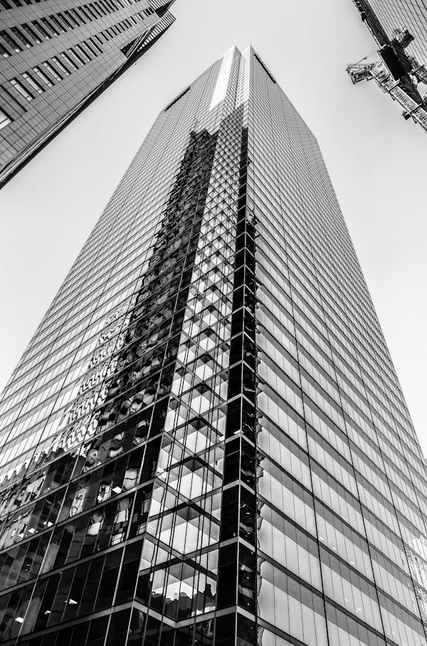 Grayscale Photo of High-rise Building