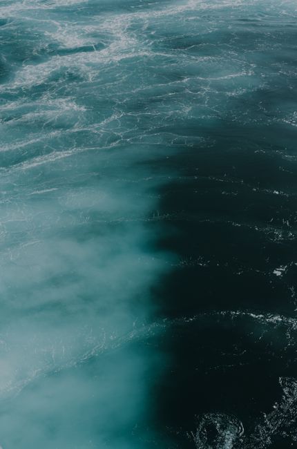 Captivating image of ocean waves showcasing dark and light blue contrasts.
