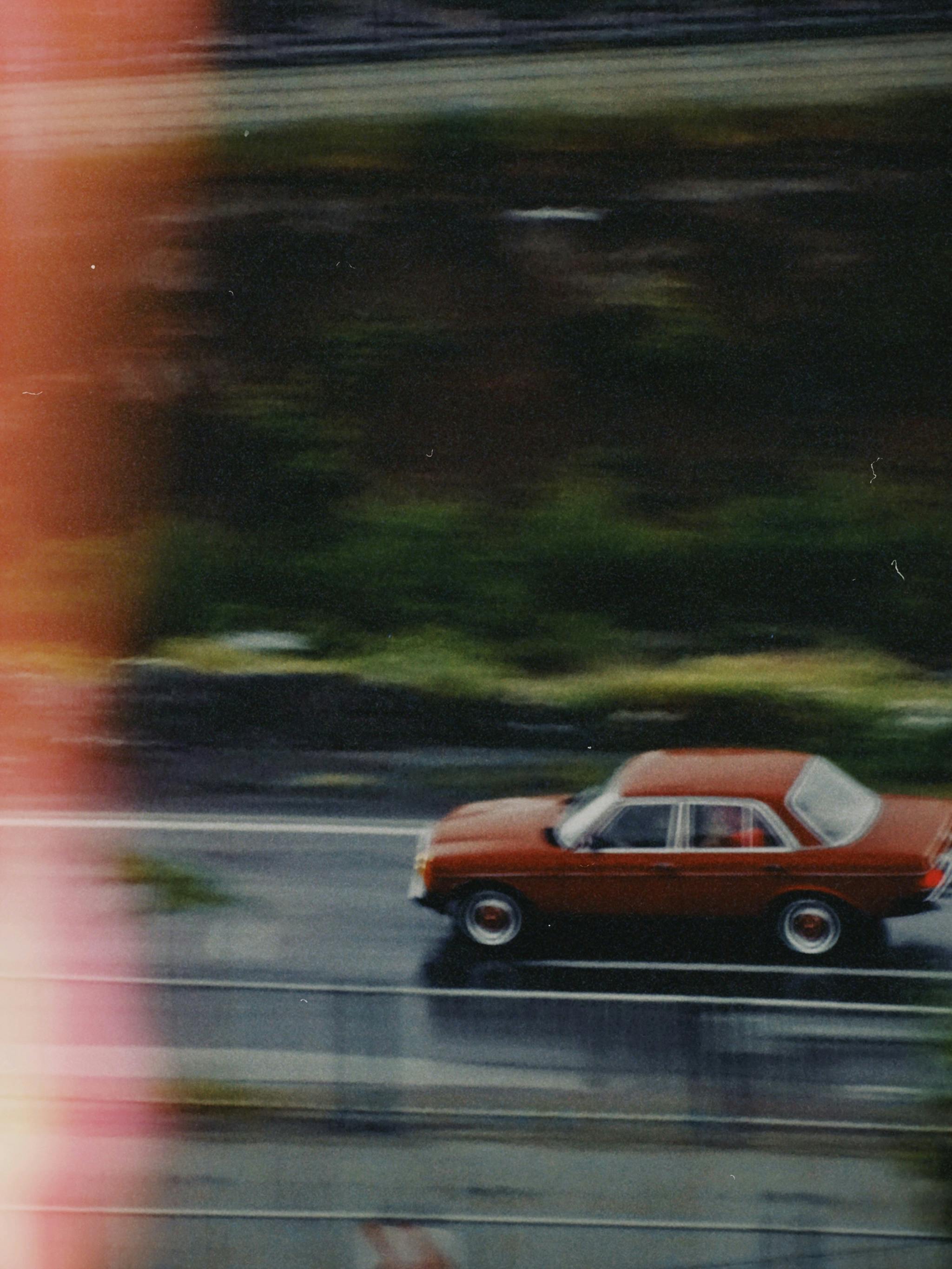 car running on road