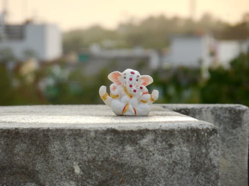 Small Ganesh Figurine on a Stone