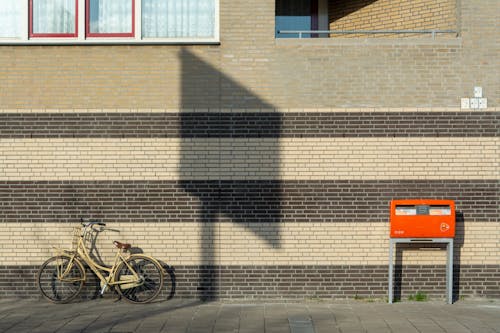 Bike and Mailbox on a Street 