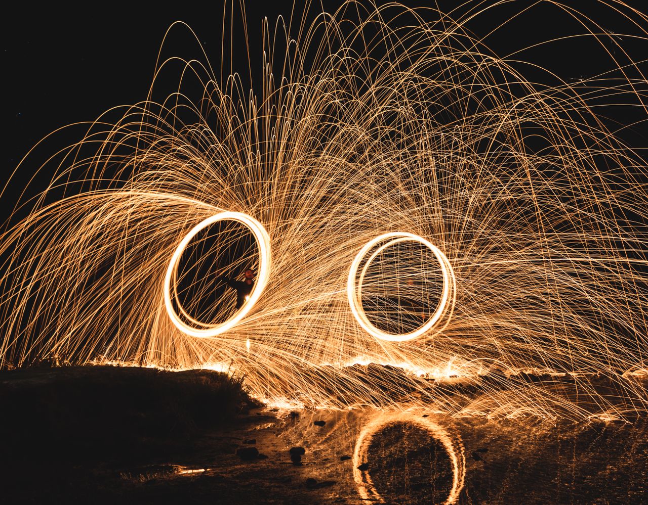 long exposure of steel wool light painting creating mesmerizing circul