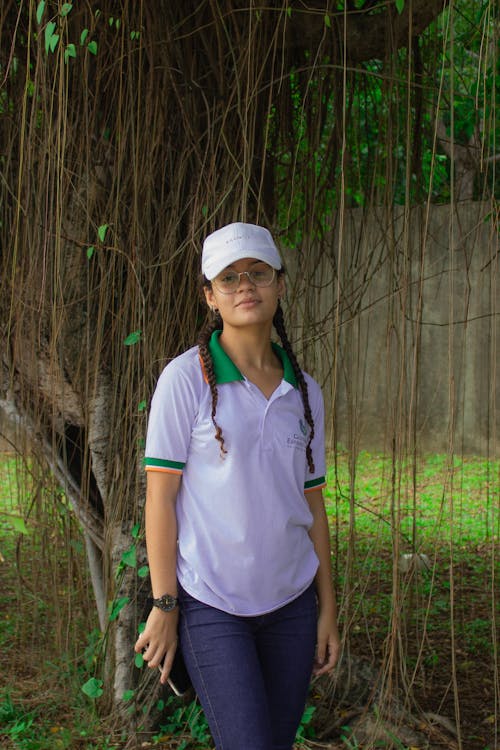 Photos gratuites de arbre, casquette, cheveux tressés