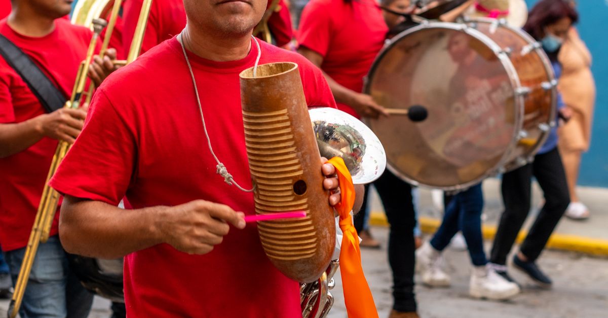 Mexican Instruments Single Men with Instruments Walking on a Street during the Guelaguetza ...