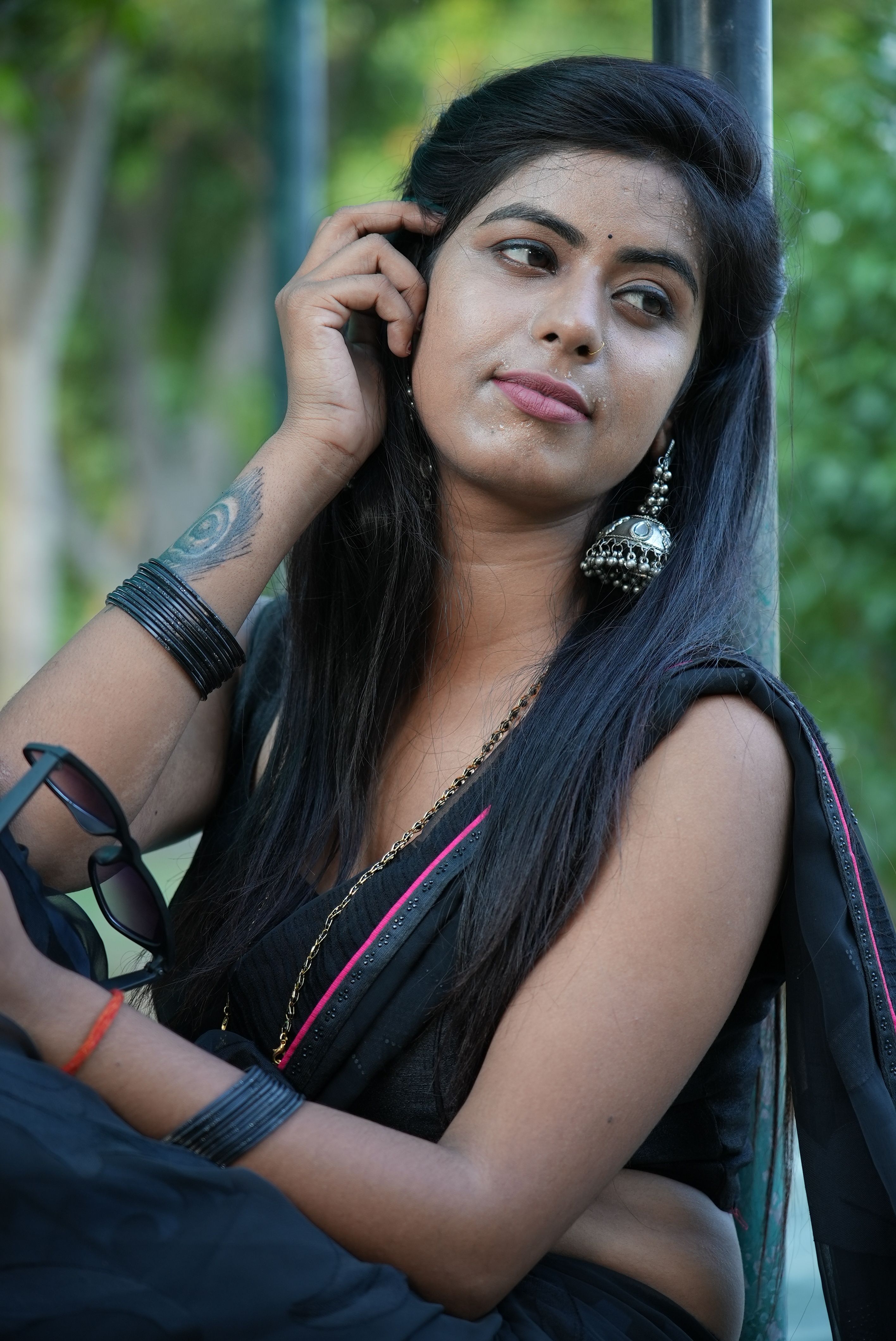 Woman with Black Hair Posing · Free Stock Photo