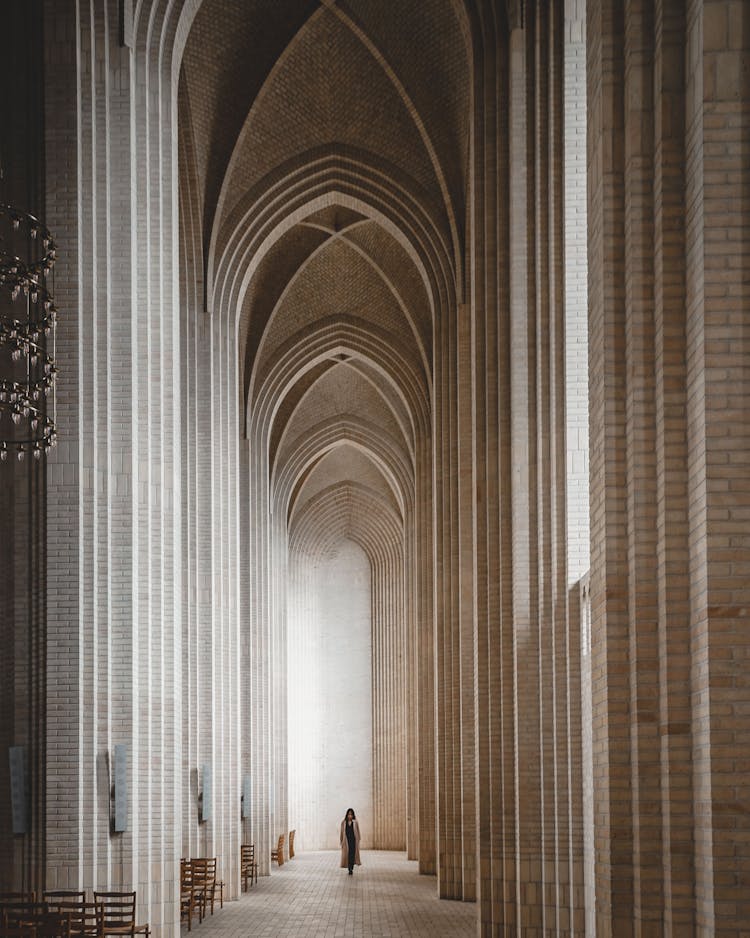 Person Walking In Cathedral