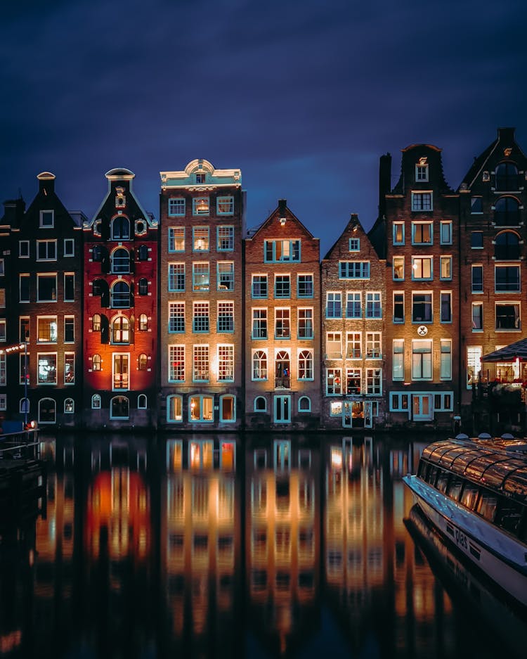 Illuminated Tenements In Amsterdam