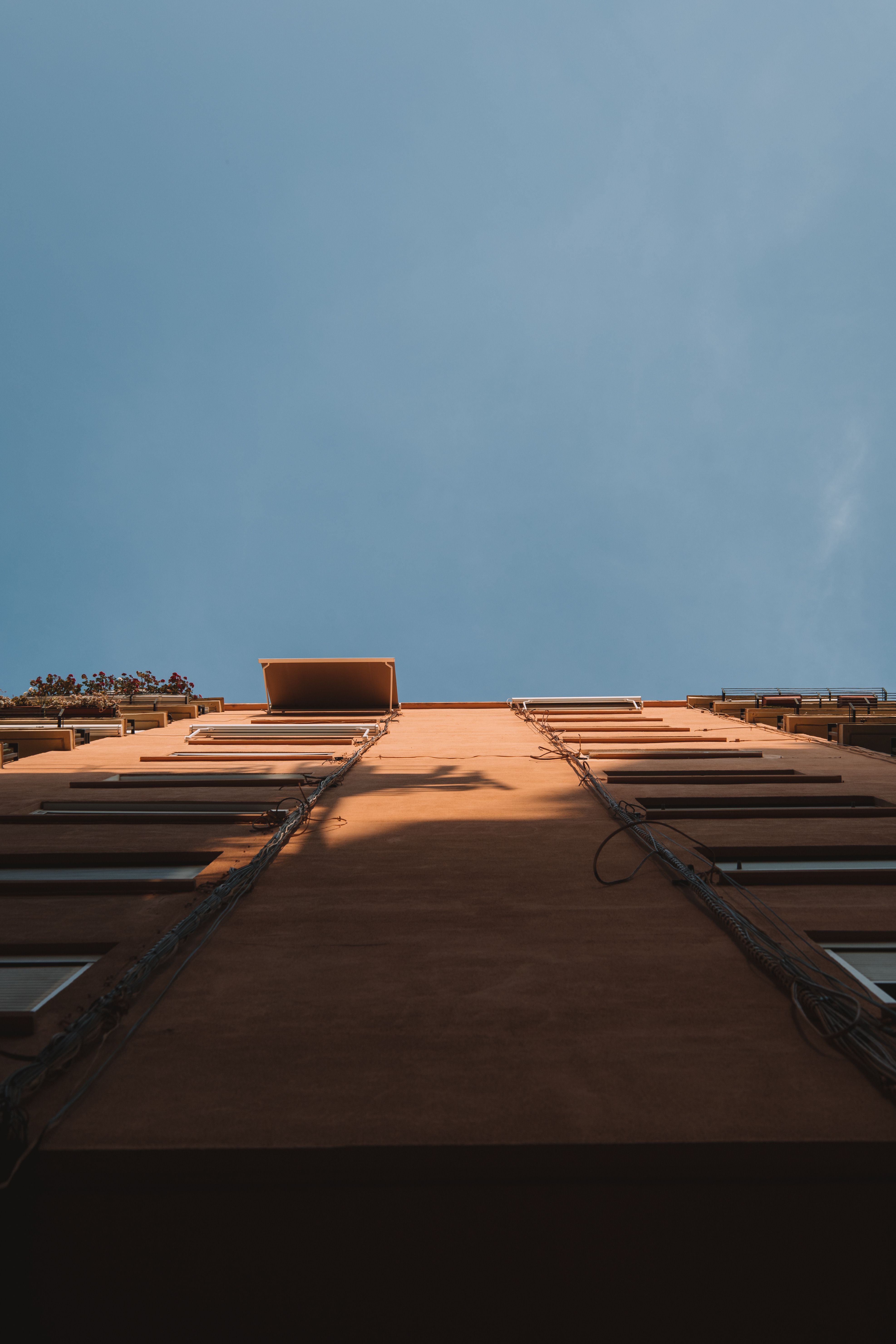 Directly Below View of Building Wall · Free Stock Photo