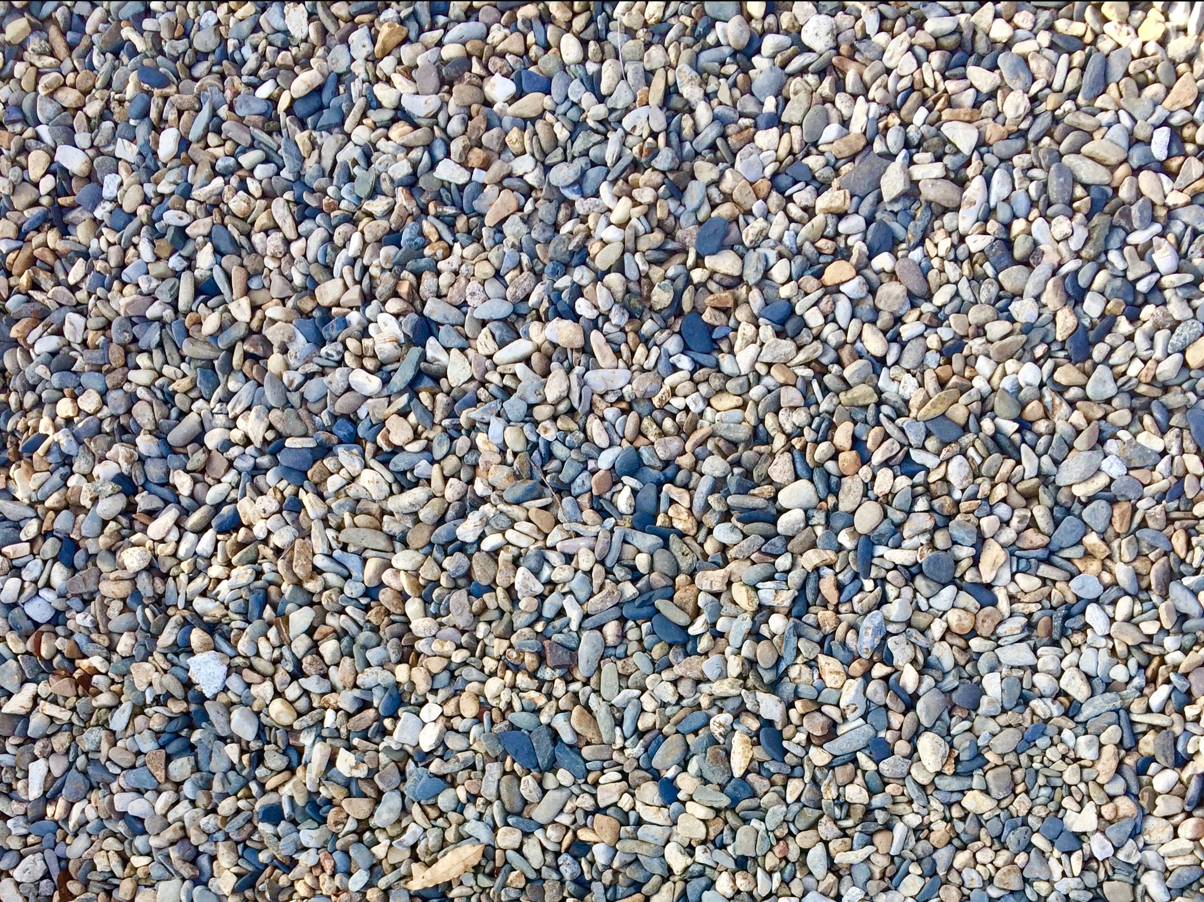 A detailed close-up of colorful pebbles found outdoors in South Korea.
