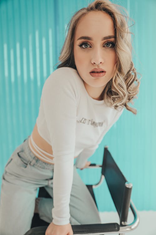 Portrait of Blonde Woman on Chair