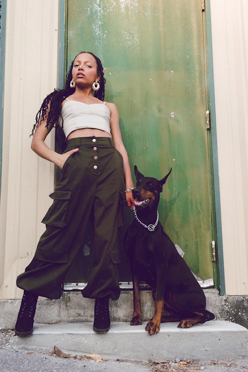 Woman Posing with Doberman