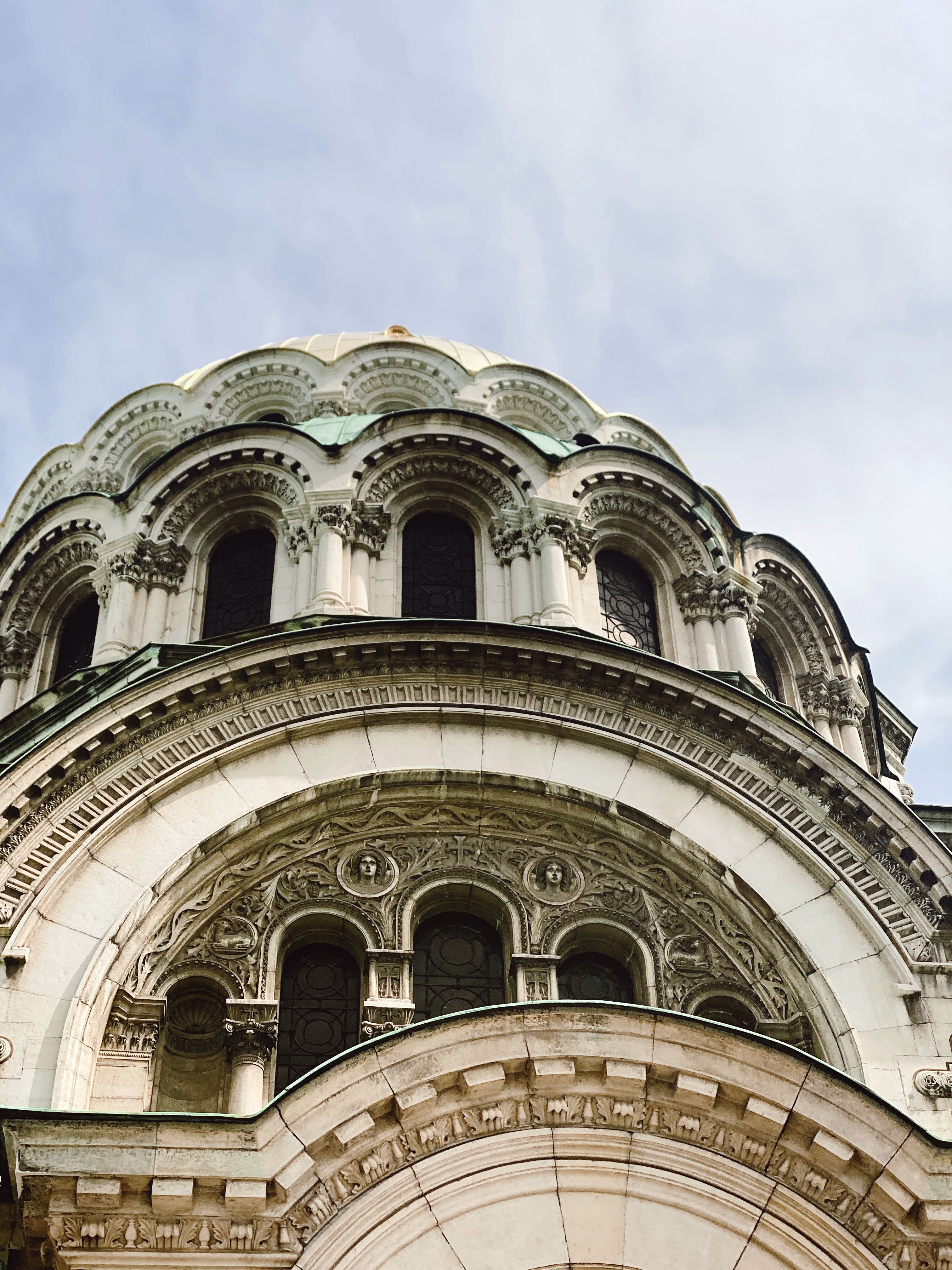 Close-up view of the ornate dome of a cathedral in Sofia, showcasing detailed architecture.