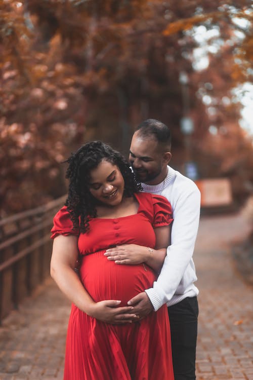 A Portrait of a Couple Expecting a Baby
