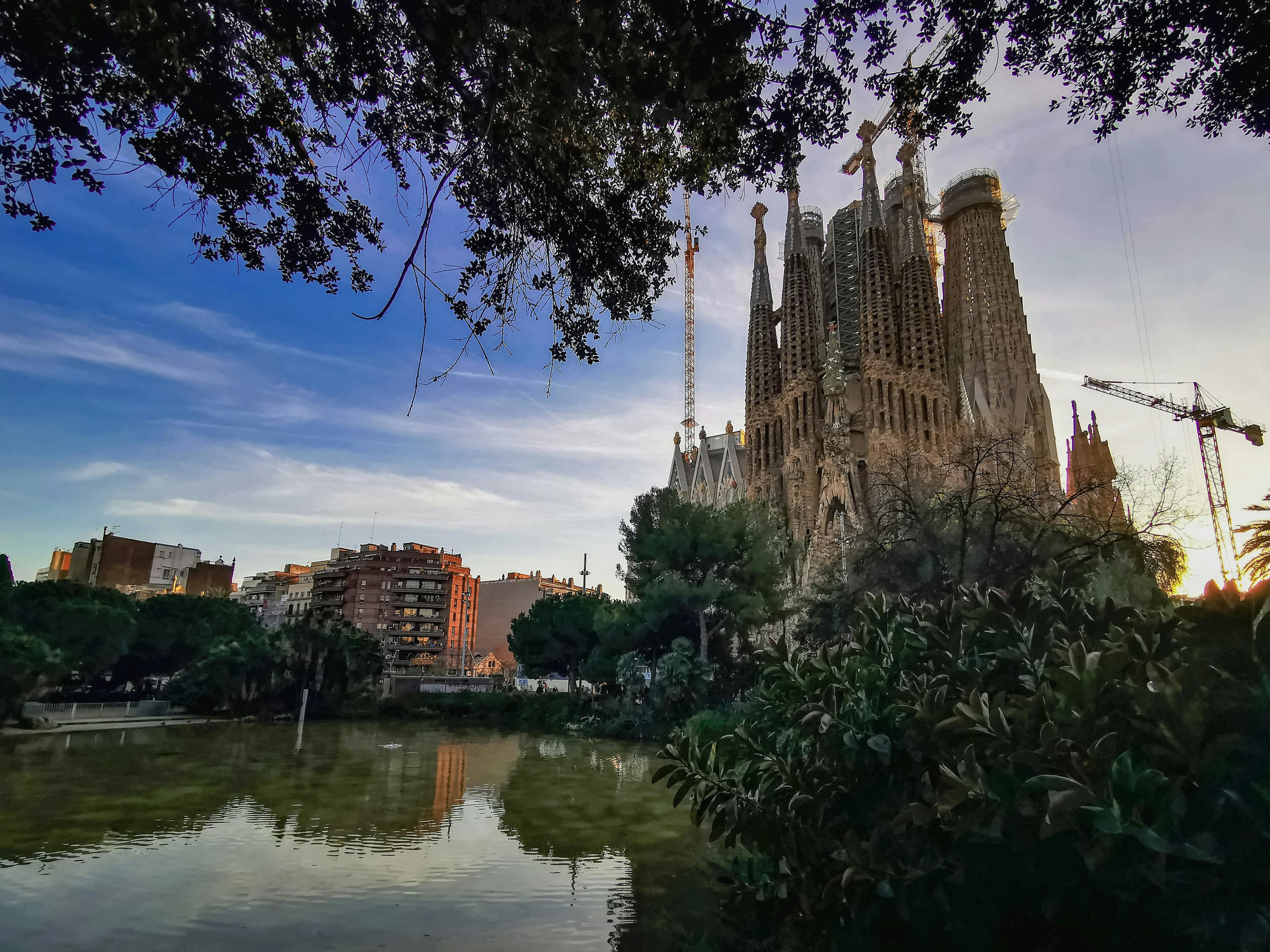 river by sagrada familia in barcelona spain