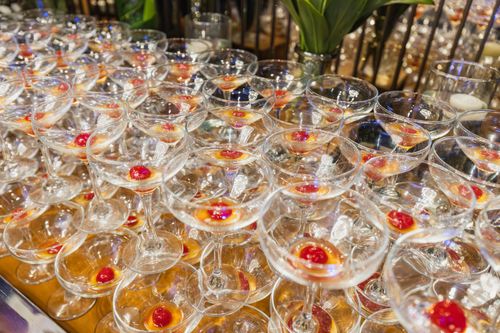 Free Close-up of elegant cocktail glasses with red cherries, ideal for party scenes. Stock Photo