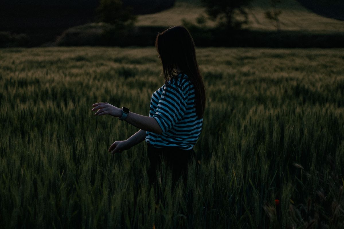 Woman in Rye Field Looking at the Sunset · Free Stock Photo