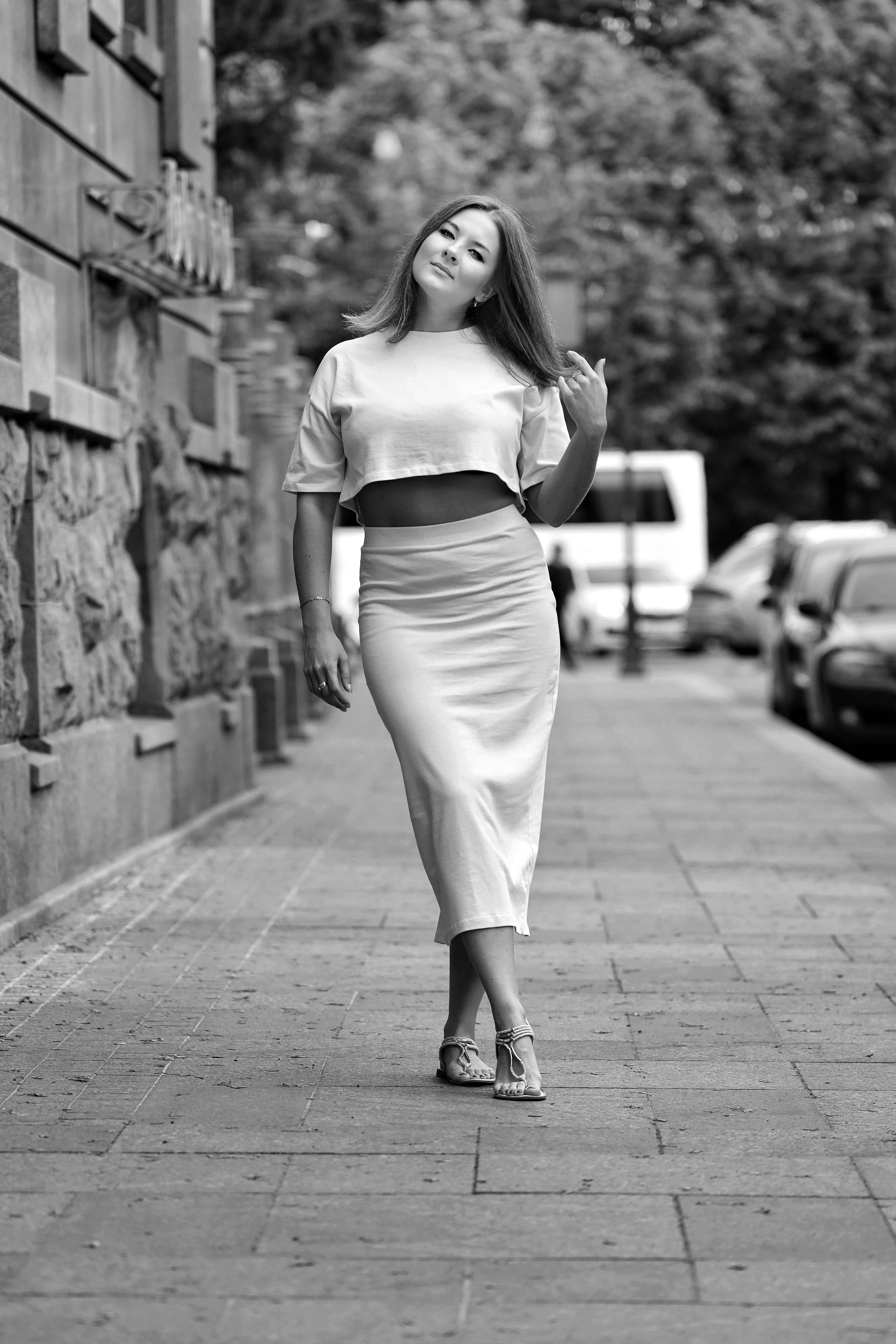 Young Woman in a Long Skirt Posing in City · Free Stock Photo