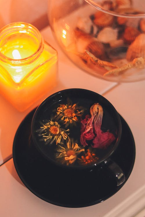 Candle and a Cup of Herbal Tea 