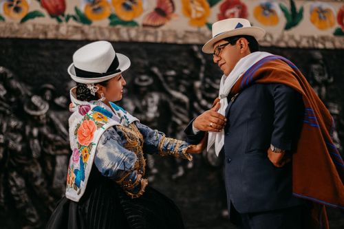 Free Couple in vibrant costumes performing traditional dance at Jauja festival, Peru. Stock Photo