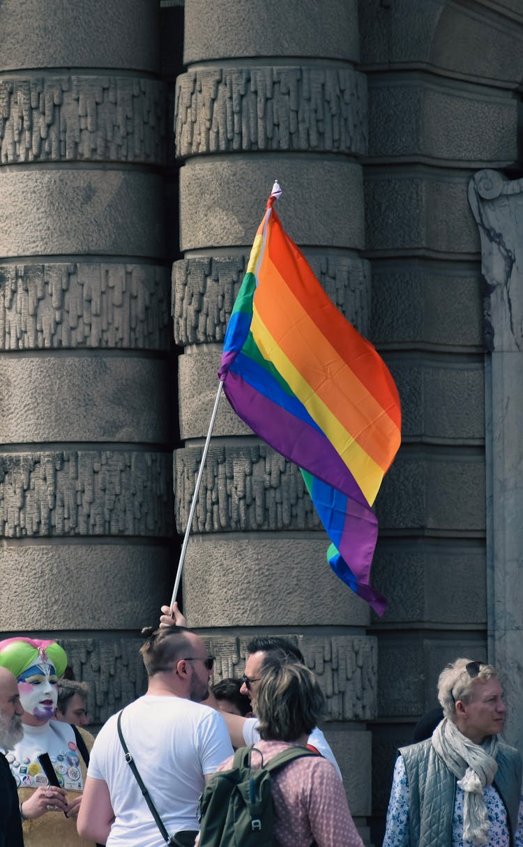 Group Of People With LGBT Flag