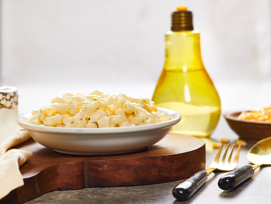 Creamy shell pasta in a wide bowl — photo by Pitamaas on Pexels