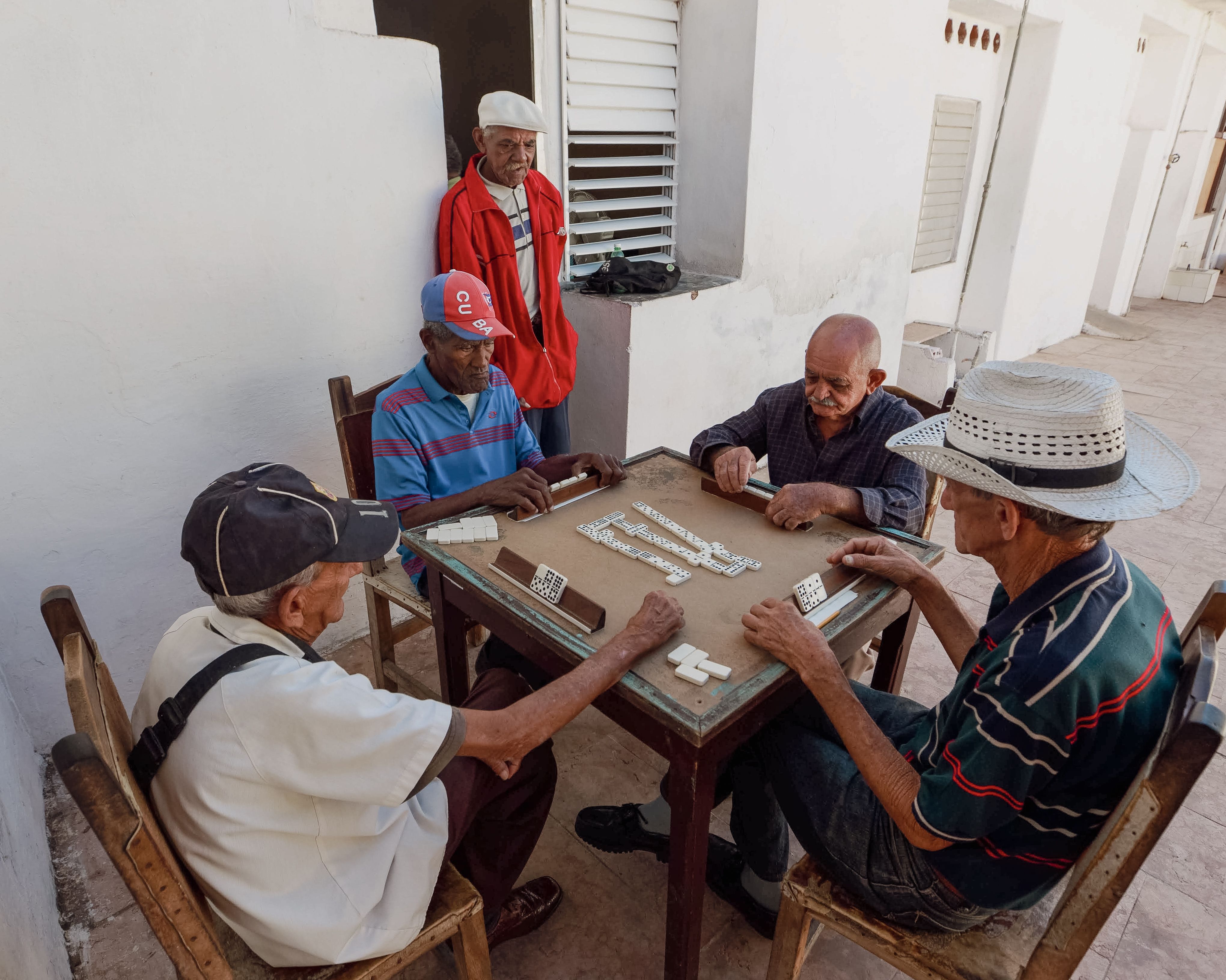 Four Friends Playing Domino 