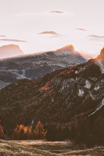 A breathtaking view of mountains at sunset with dramatic lighting and scenic beauty.