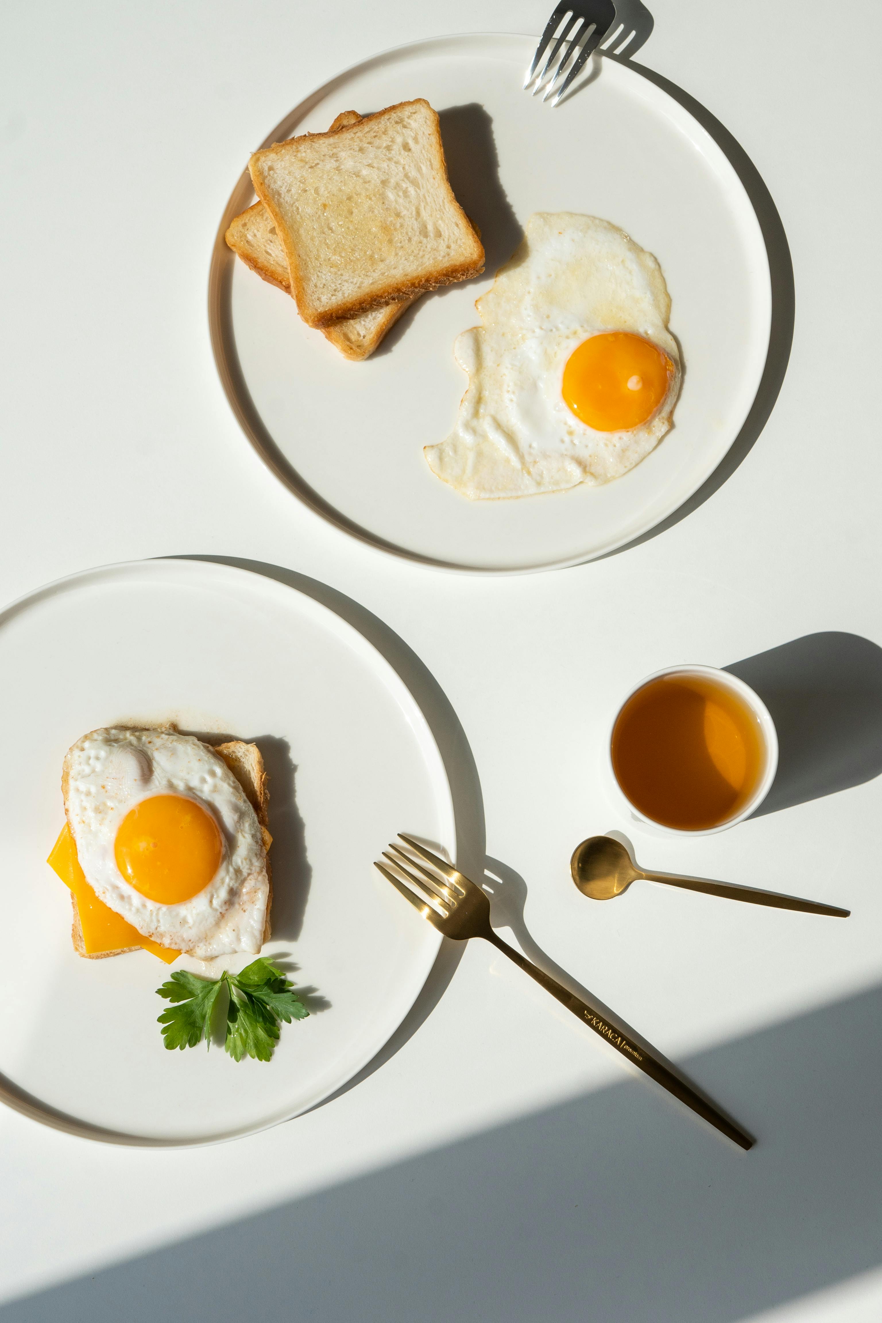 fried eggs on a plate without the plate