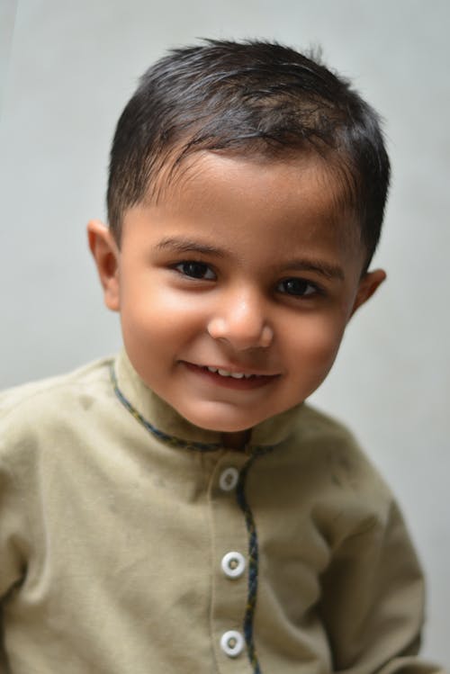Free Portrait of a Happy Little Boy  Stock Photo