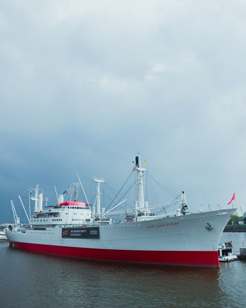 Free The iconic Cap San Diego moored in Hamburg, showcasing maritime history under an overcast sky. Stock Photo
