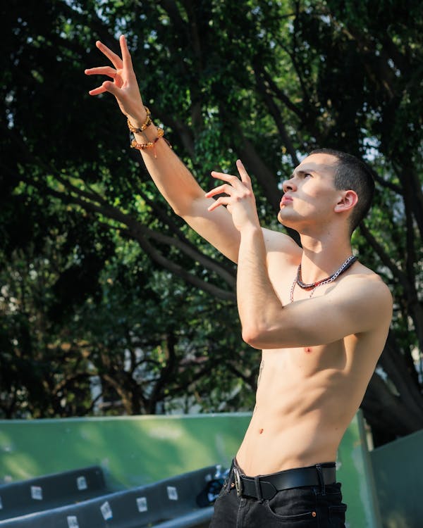 Shirtless Man Posing Outdoors