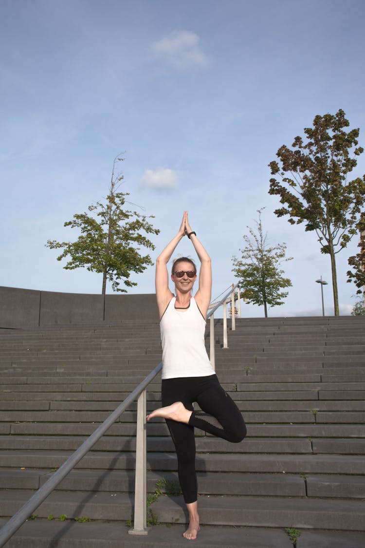 Woman Exercising At Park