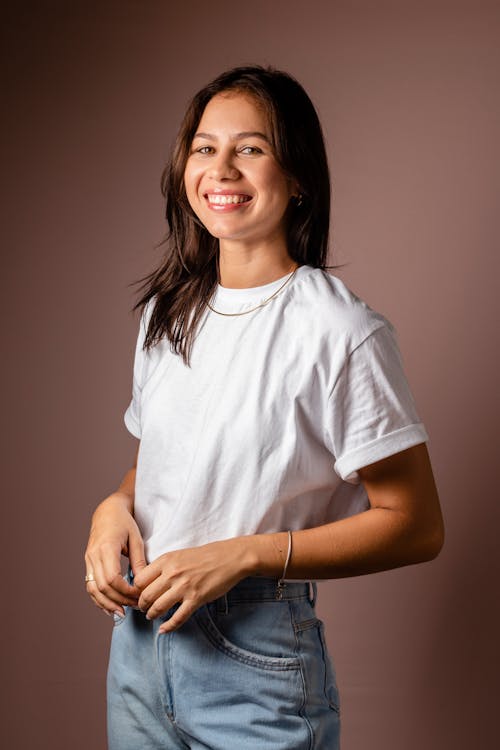 Young Woman in a Casual Outfit Posing in Studio 