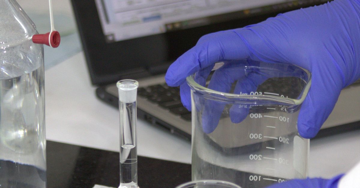 Lab Mixtures Laboratory Technician Mixing Reagents · Free Stock Photo