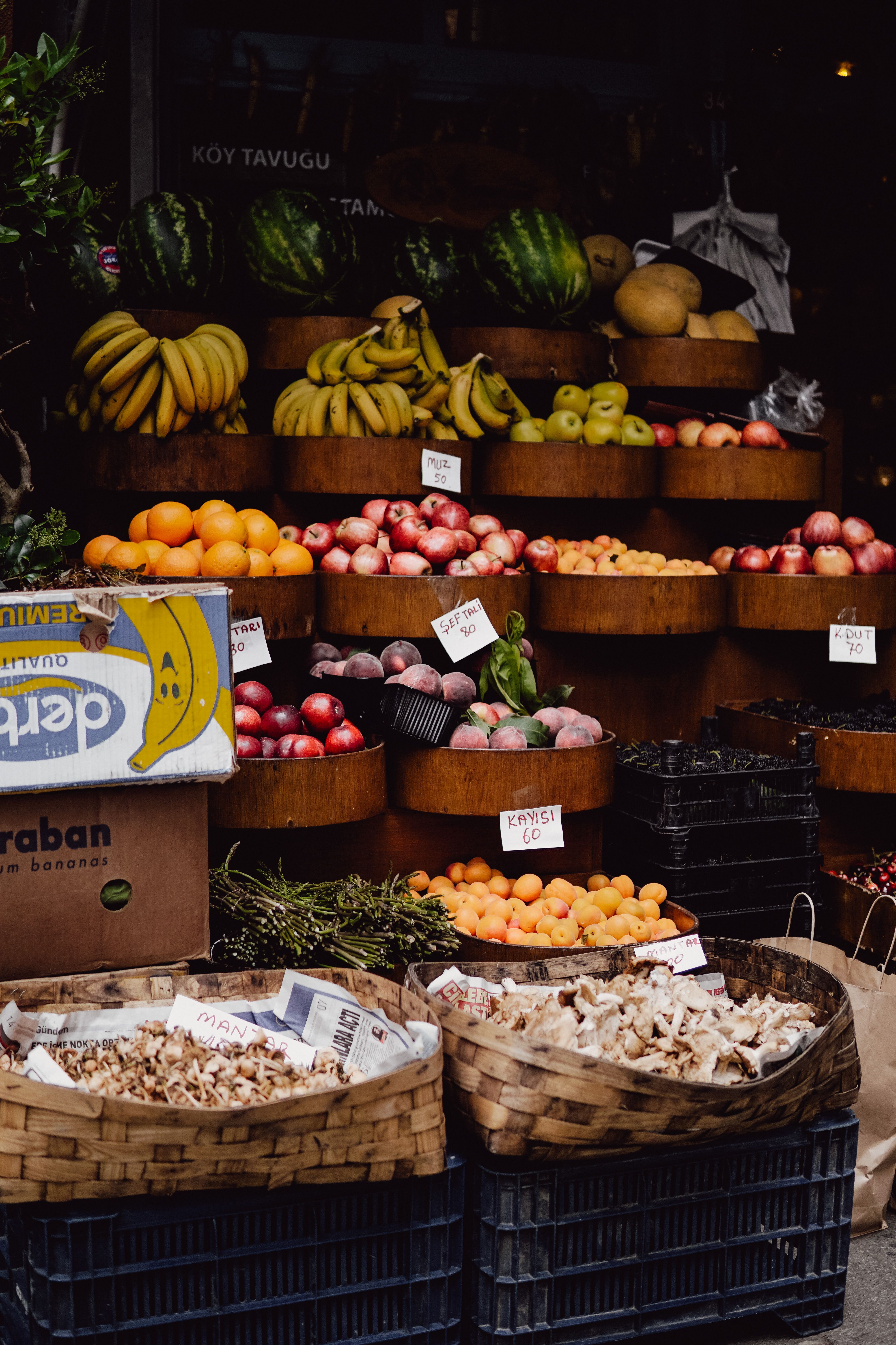 Colorful fresh fruit display at a grocery store — Beyza on Pexels