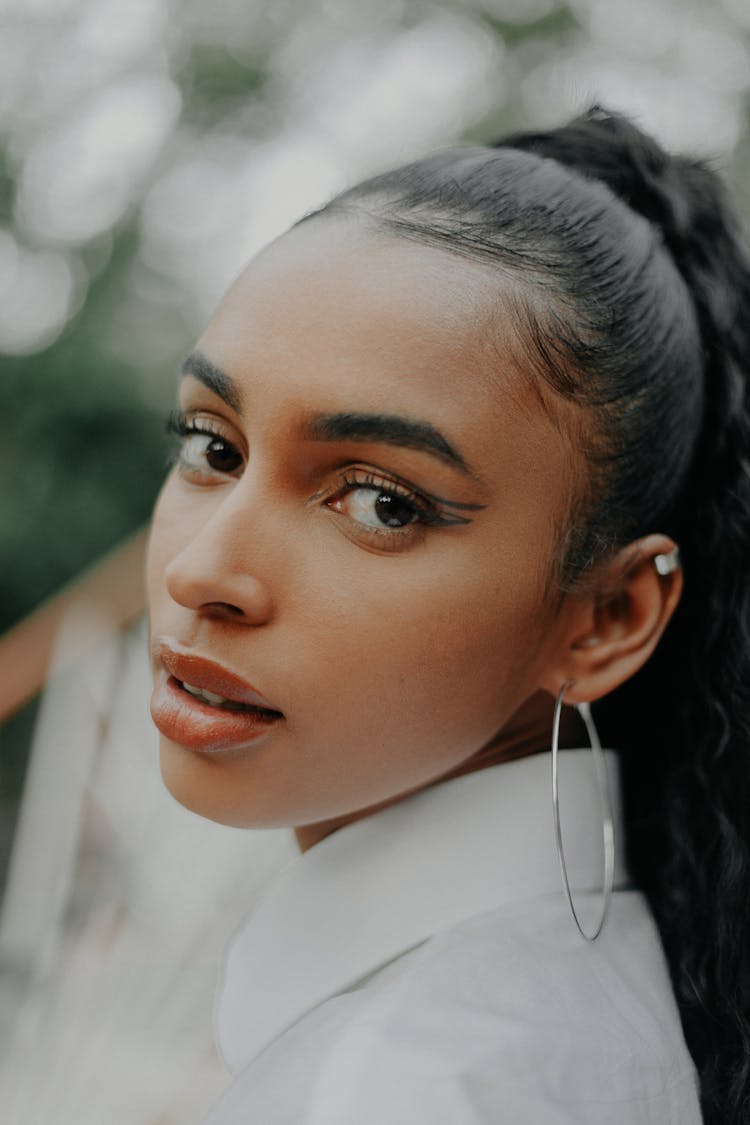 Young Woman With Large Round Earring