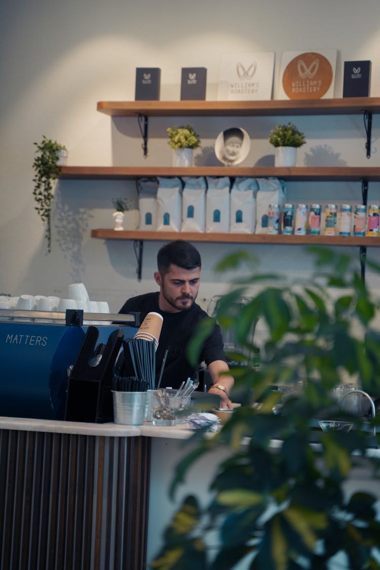 Man Working At Cafe