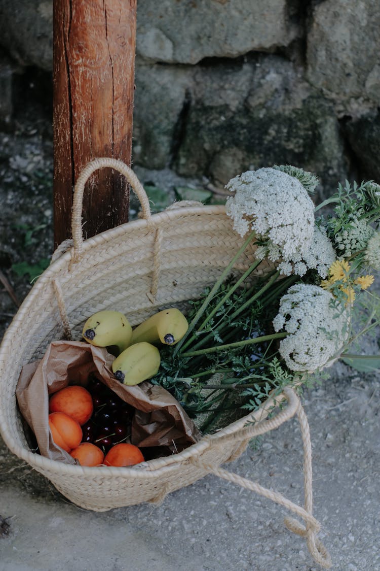 A Bunch Of Fresh Fruit And Vegetables In A Basket 