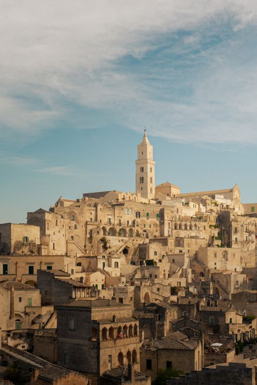Free A stunning aerial view of Matera, showcasing its ancient stone buildings and historic charm. Stock Photo