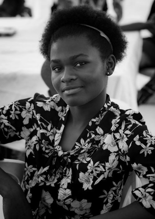 Free Striking black and white portrait of a confident woman showcasing elegance and grace. Stock Photo