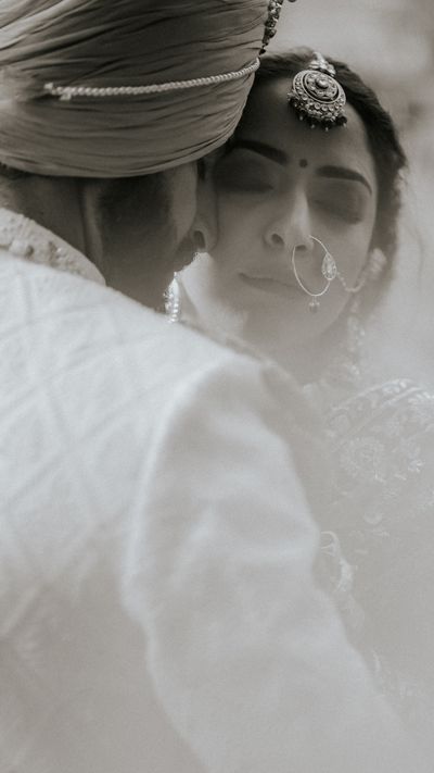 Couple in traditional attire, groom in turban